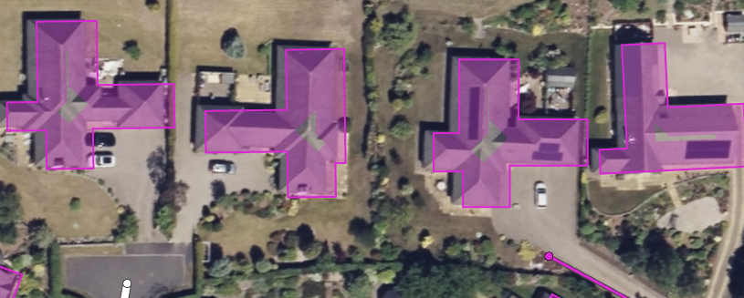 aerial imagery with houses surrounded by ML generated boundaries